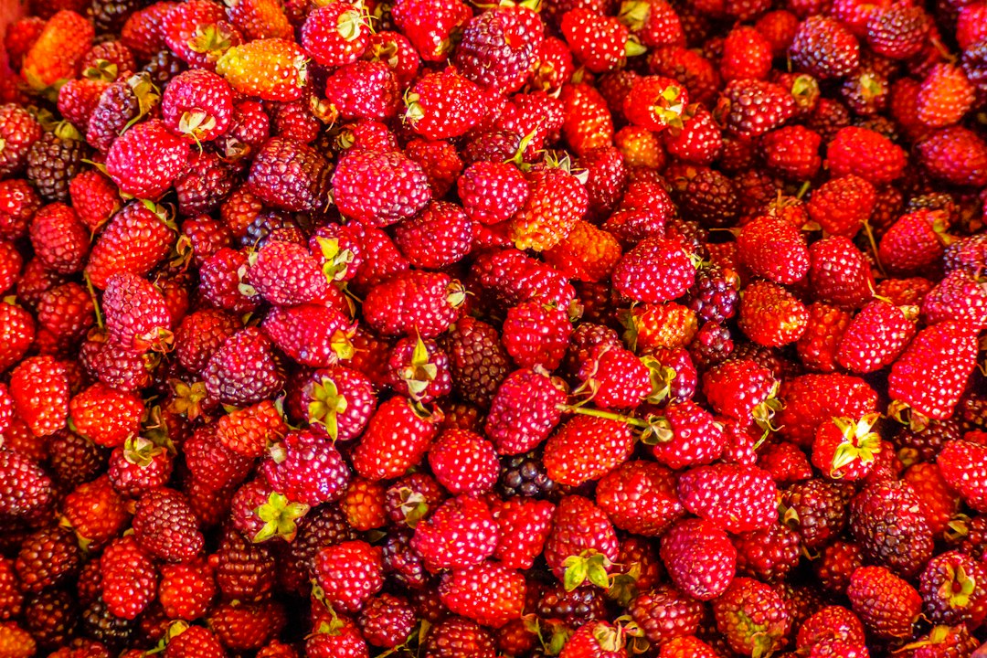 red strawberries on white ceramic plate